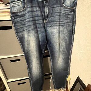 KanCan jeans with frayed bottoms. High rise ankle skinny